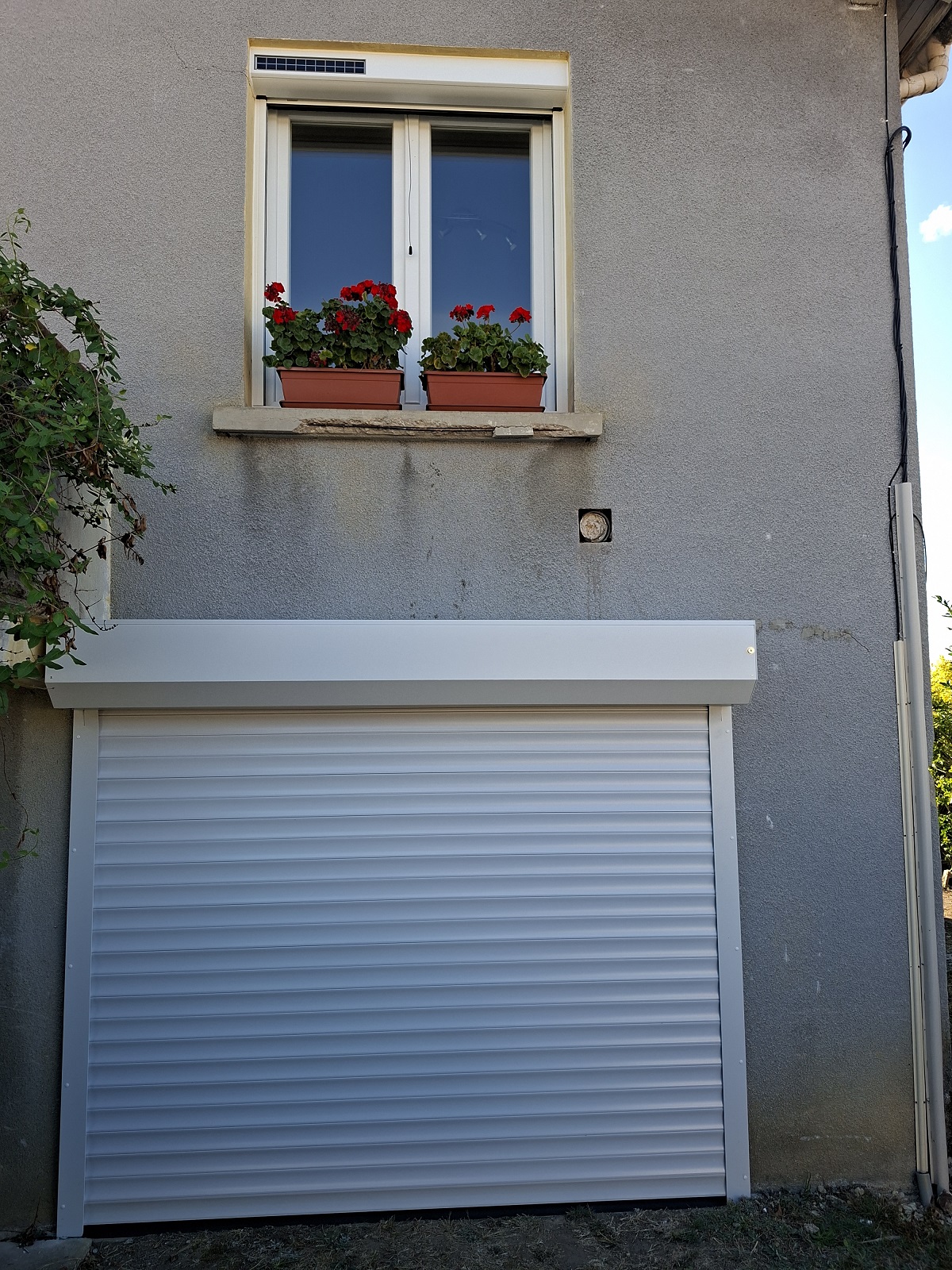 Installation menuiserie et porte de garage commenailles apres